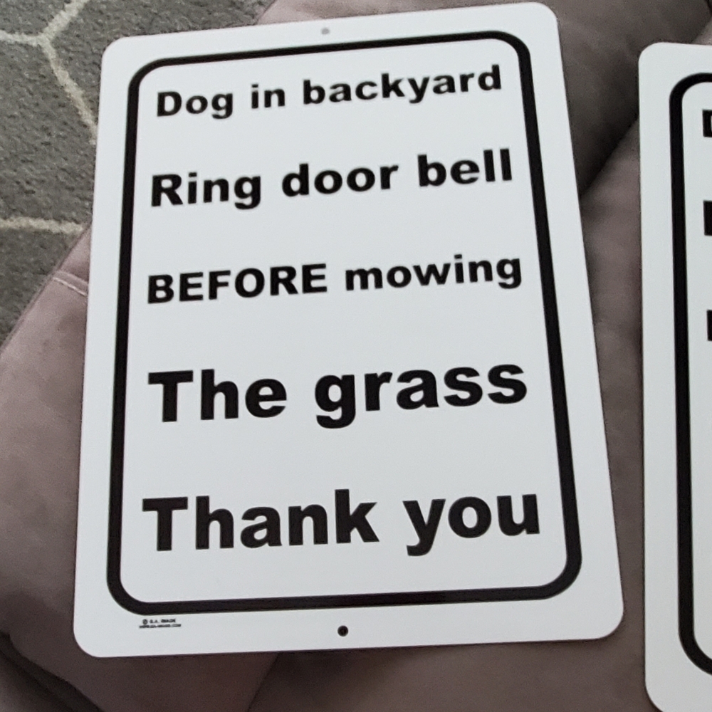 Dog backyard signs, mowing grass